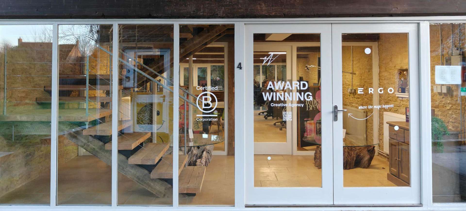 Photo of office frontage with B Corp logo placed on image