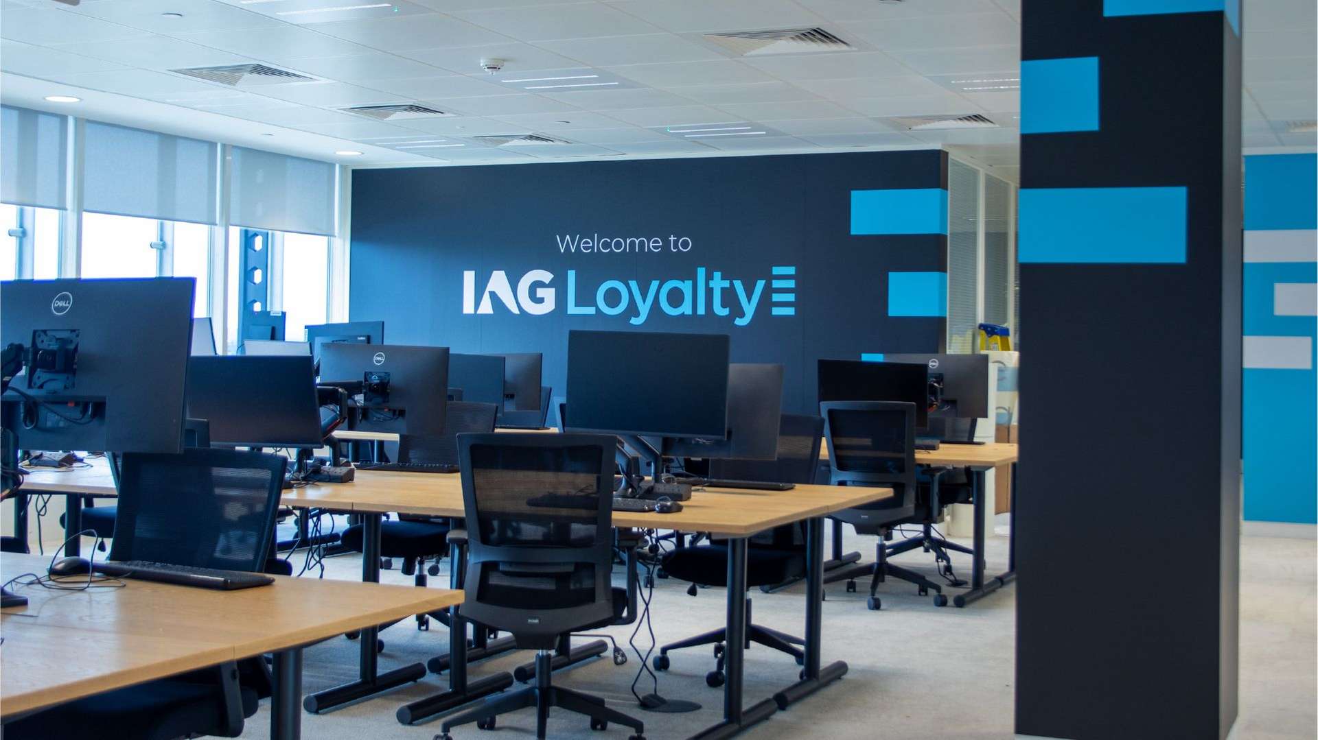 IAG Loyalty logo on the wall of an office space
