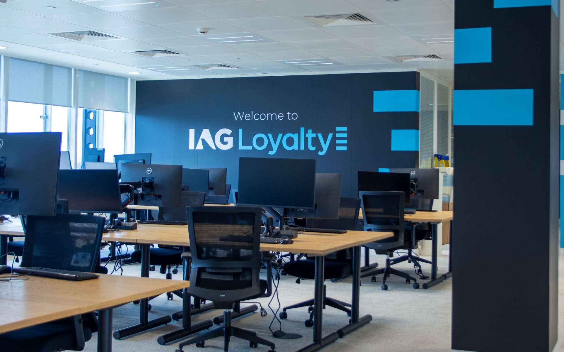 IAG Loyalty logo on the wall of an office space