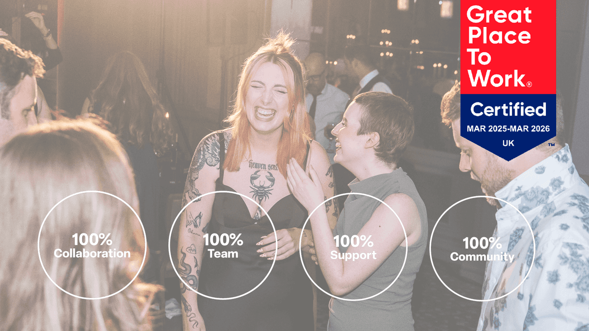 People smiling on a dance floor. Great Place to Work logo