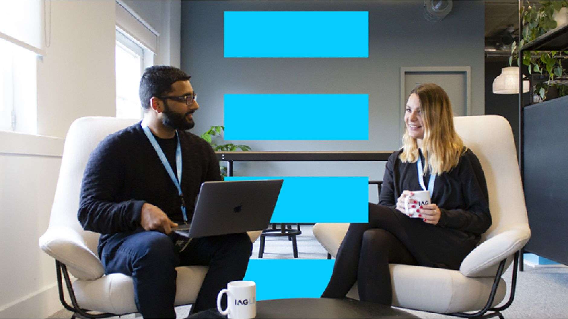 IAG Loyalty - mock up of people sitting