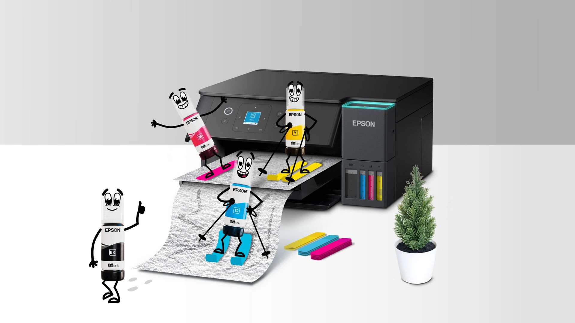 Ink bottle characters skiing down A4 paper