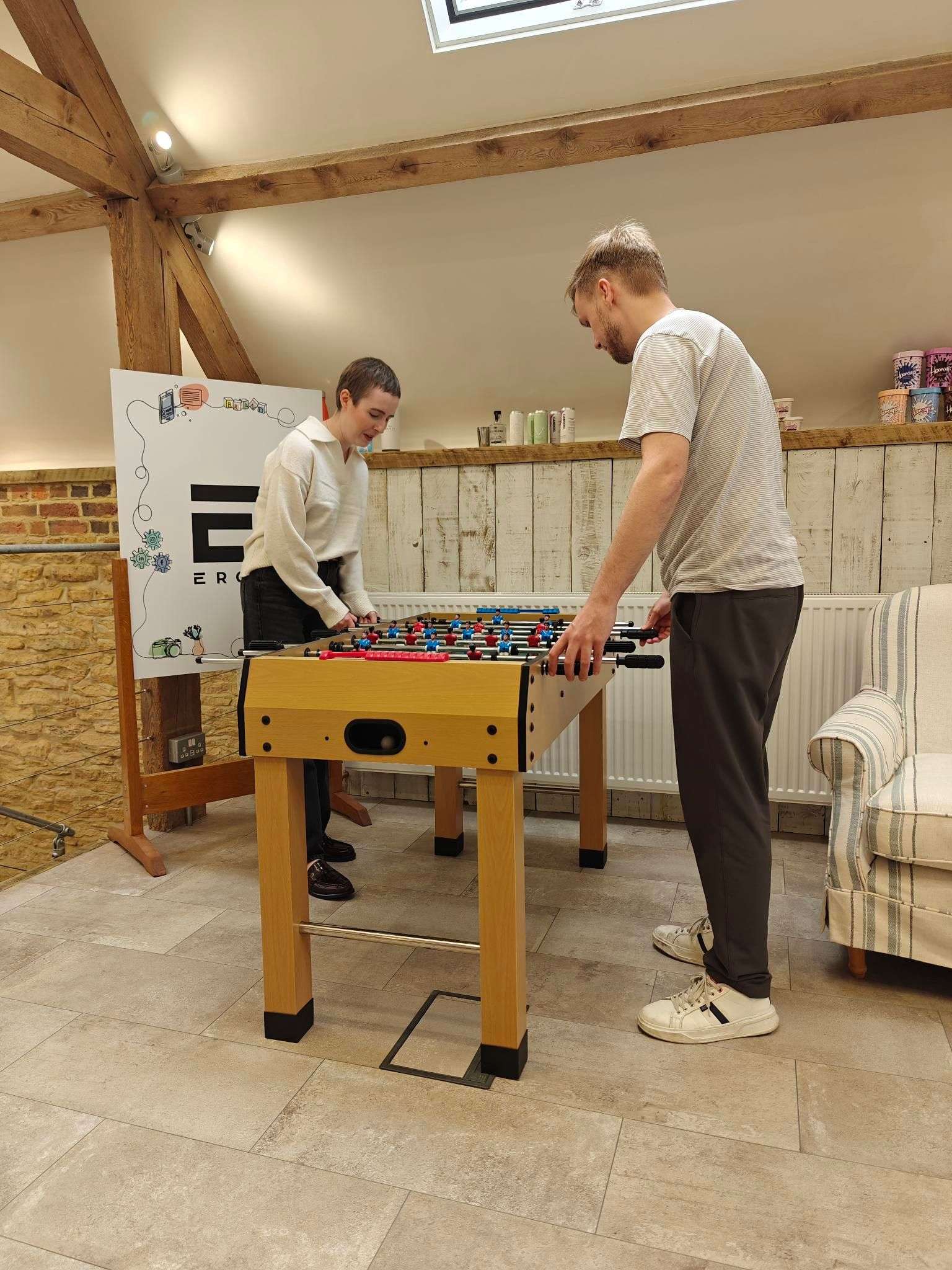 Josh and Kristina playing table football