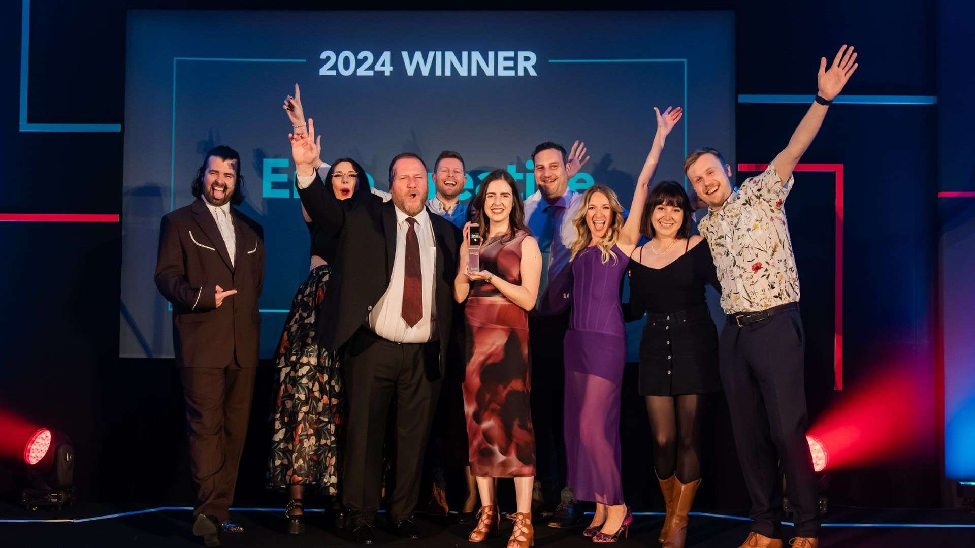 The Ergo team on stage accepting their award for best creative design agency 2023